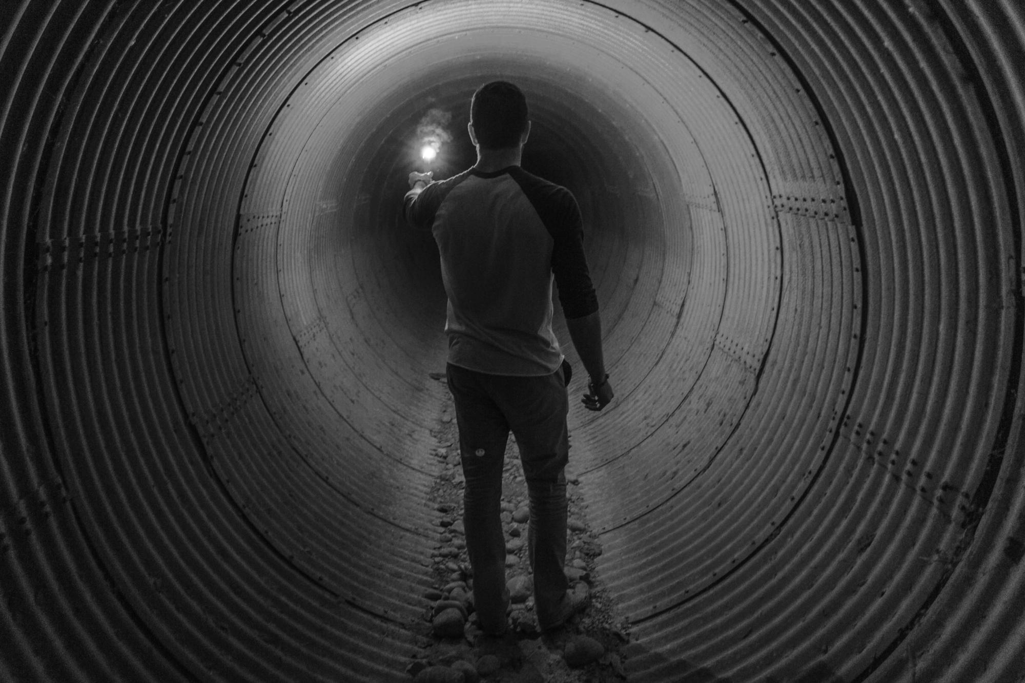 Man in a tunnel with a light at the end - Where was the virus mentioned in the Bible?