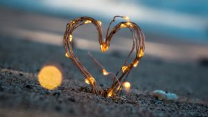 Love heart on a beach - Examples of Loving your Enemies in the Bible